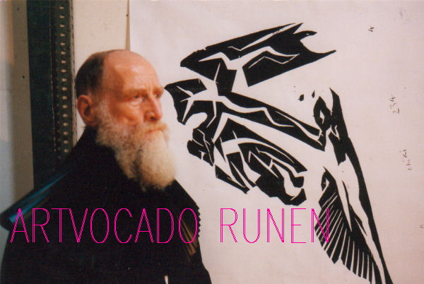 K in front of big artvocado rune